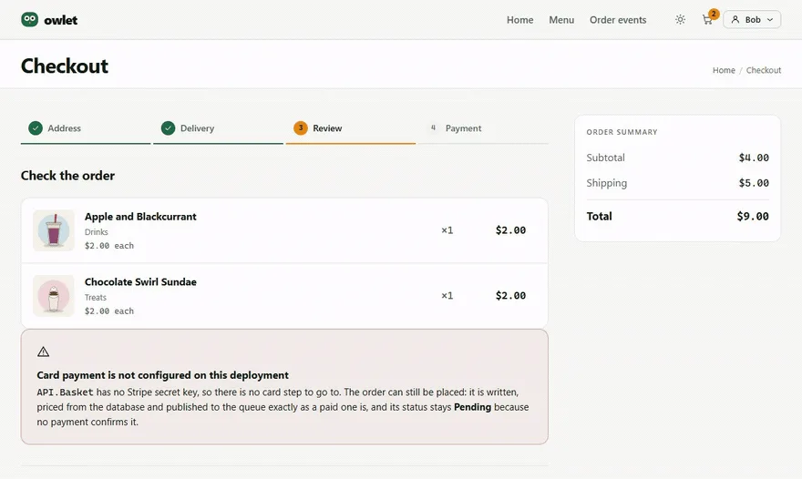 The Owlet checkout review step showing two line items, a $9.00 total, and a notice that card payment is not configured on this deployment